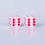 Precision dice calibrated Black with white - pink dots